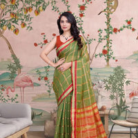 Front view of Mehendi green checkered saree in palace ambiance