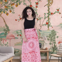 Front view wrapped in temple tones, skirt flaring like devotion