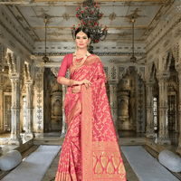 Close-up of golden motifs on bright red silk blend saree in palace interior