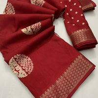 Closeup of red crape texture, intricate print and soft sheen