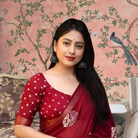 Front view of ❤️ Lohini red cotton crape printed saree styled in ethnic setting
lohini-red-crape-saree-back-view