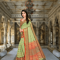 Close-up of soft border design on light green Kota Doria cotton fabric in palace backdrop