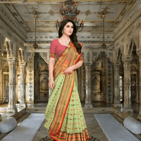 Light green Kota Doria saree with elegant border in standing pose inside palace room