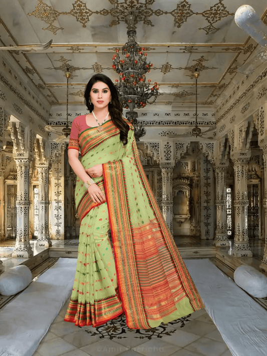 Flowing pallu of light green Kota Doria saree captured mid-air with border detail