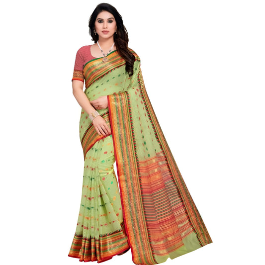 Neatly pleated light green saree in standing pose, captured in studio light