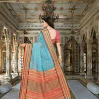 Pallu falling naturally in standing pose, capturing fabric’s breezy flow and elegance.