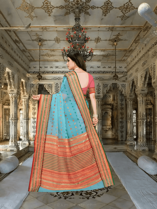 Pallu falling naturally in standing pose, capturing fabric’s breezy flow and elegance.