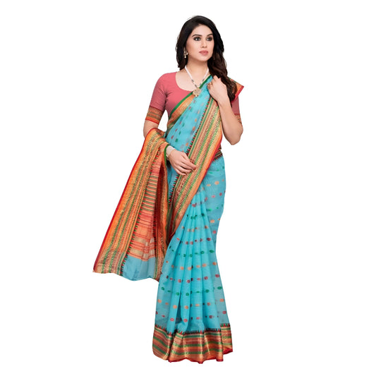 Side standing pose of MeghMalika saree, dot motifs and sky tone drape visible in studio setting.