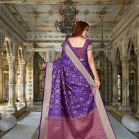 Side view of pallu showcasing gold borders and flower motifs in palace room