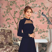 Closeup of high neckline and smooth knit detail