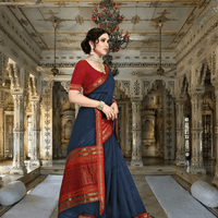 Model standing by stone arch, navy drape glowing with tricolor border under golden light