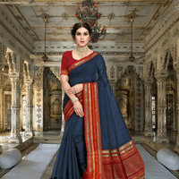 Side angle showing red blouse, soft cotton flow, heritage vibe intact