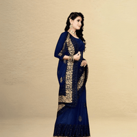 Flat lay of navy netted saree in studio, detailed threadwork catching soft lighting