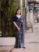Model twirling to show cosmic navy-blue
 gradient