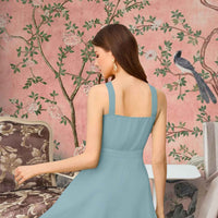 Back shot of pista halter dress with fitted silhouette