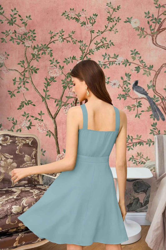 Back shot of pista halter dress with fitted silhouette