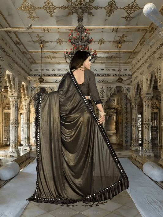 Professional woman wearing mocha saree in corporate setting