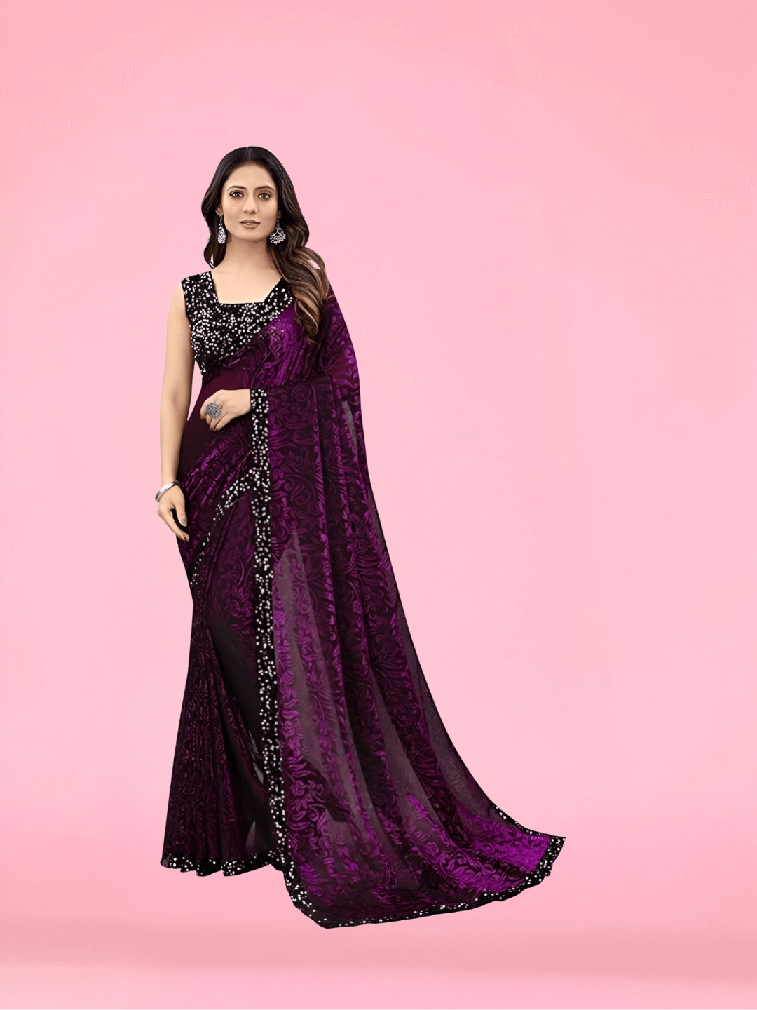 Woman twirling in wine floral saree for evening party