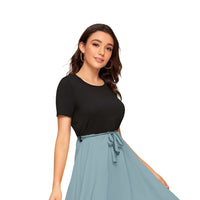 Side angle of black-grey knit dress by Celestina with no background