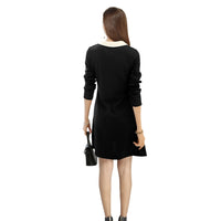 Clean white background – back view of the monochrome dress