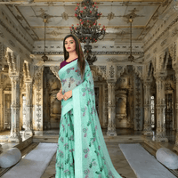 Full pallu view of floral printed cotton saree flowing naturally in palace setting