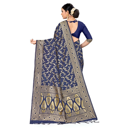 Golden pallu spread out on navy saree in studio lighting