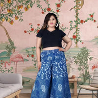 Front view of blue printed palazzo pants under soft daylight