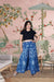 Front view of blue printed palazzo pants under soft daylight