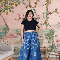 Front view of blue printed palazzo pants under soft daylight