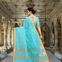 Zoom on golden borders and intersecting threads with sky blue base