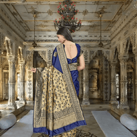 Full pallu view of Banarasi silk saree with zari work in regal indoor setting
