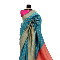 Studio front pose of aqua blue Banarasi saree with clean pleats – white background