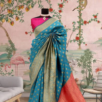 Front view of 💎 Neelakanjani aqua blue Banarasi printed saree – palace-style background