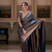 Model in Neelantara saree posing in palace room, front view