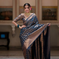 Model in Neelantara saree posing in palace room, front view
