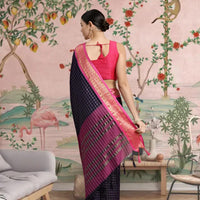 Rear view showing navy silk pallu in regal twilight tone