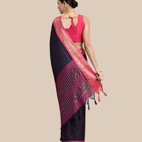 Studio back shot highlighting pallu drape and checkered detailing