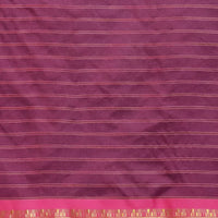 Studio close-up of navy checkered pallu and gold edge glint