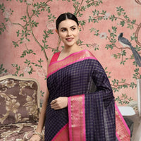  Front view of navy blue checkered saree in royal setting