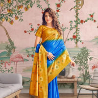 Front view of blue-yellow cotton saree glowing in regal palace setting
