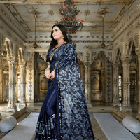 Navy saree glowing like antique jewelry
