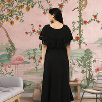 Back view of CELESTINA jet black evening gown