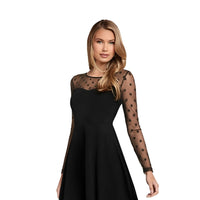 Studio front pose – classic black elegance with sheer neckline