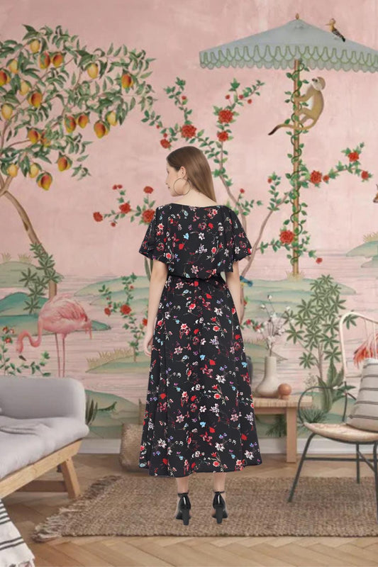 Back view of black floral CELESTINA crepe gown