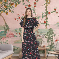  Front view of black floral full-length gown in palace interior