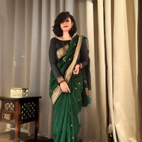 Model standing tall in Noor-E-Zehen within palace setting