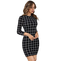 Studio model shot of the "Obsidian Empress" Bodycon Dress featuring a high neckline and clean finish.