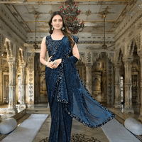Liquid black border on navy saree – luxury trim detail