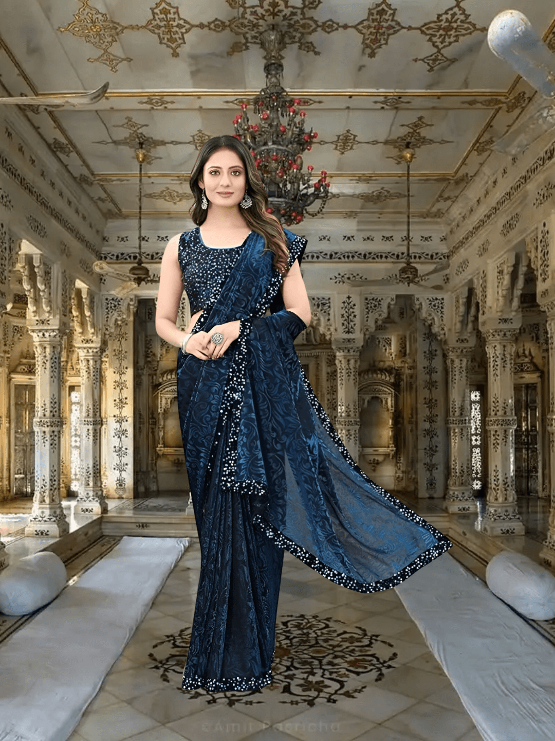 Liquid black border on navy saree – luxury trim detail