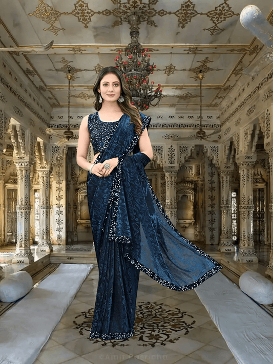 Liquid black border on navy saree – luxury trim detail